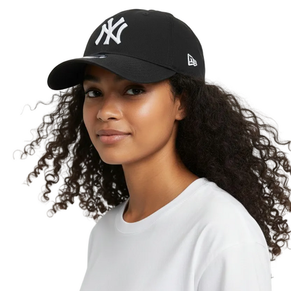 Woman wearing a black cap with a logo on a white background