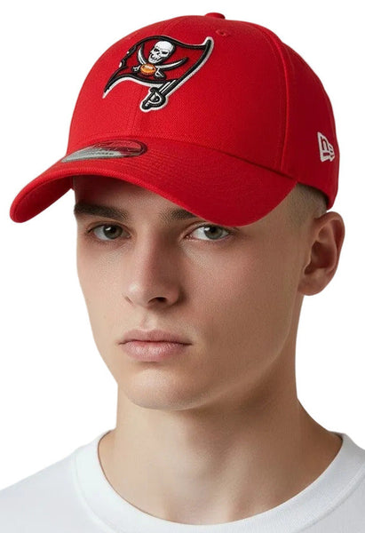Person wearing a red cap with a logo on a white background
