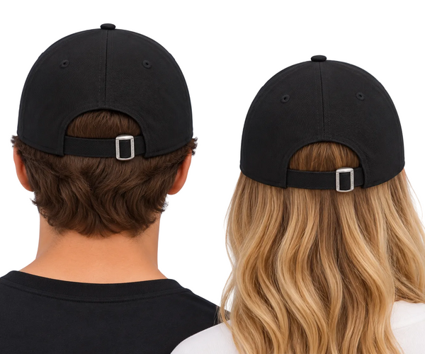 Two people shown from the back wearing black baseball caps with adjustable black straps and silver metal buckles, set against a light blue sky background.
